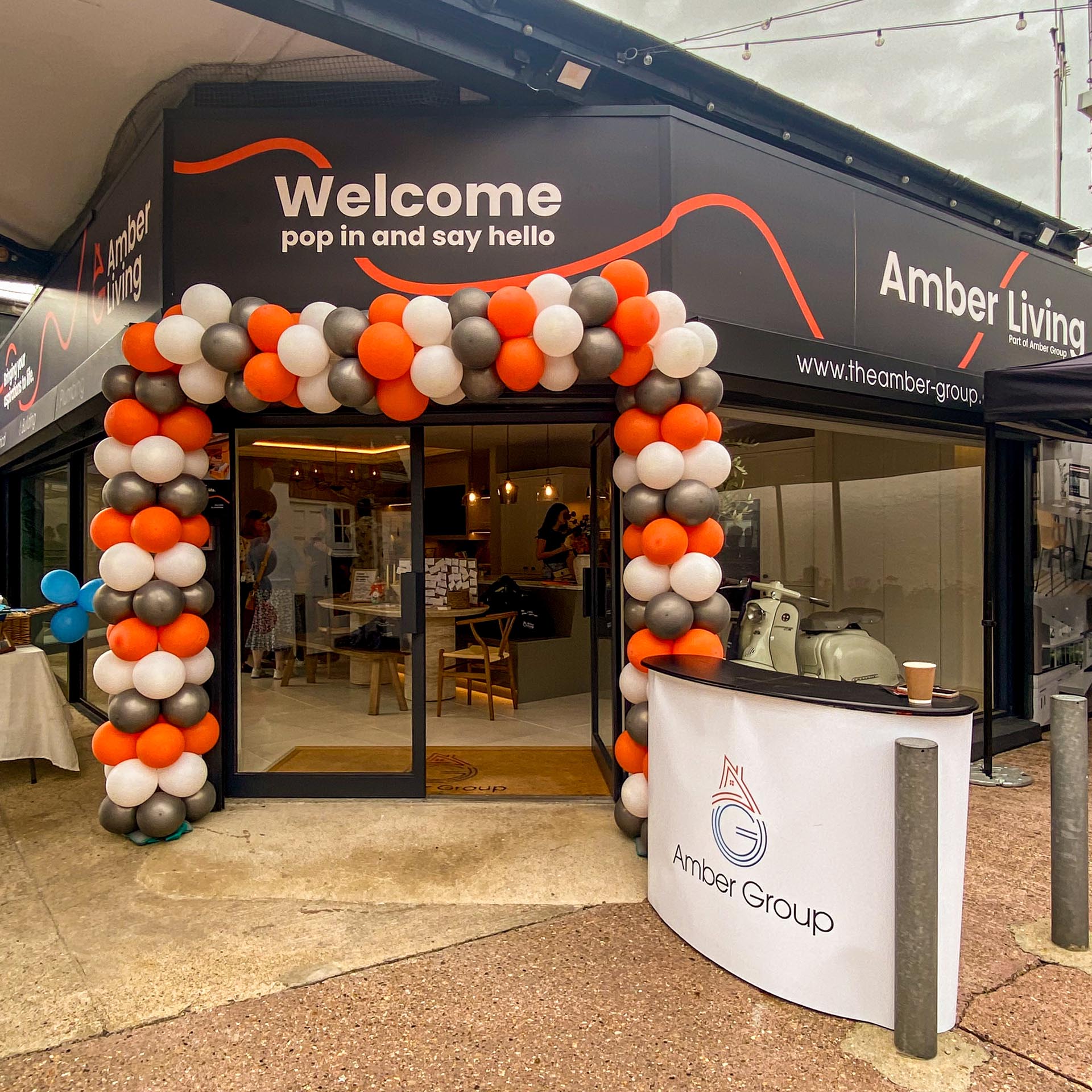 Amber Living Showroom Epsom Surrey Amber Group 110707 Amber Living Showroom Epsom Surrey Amber Group balloons around door